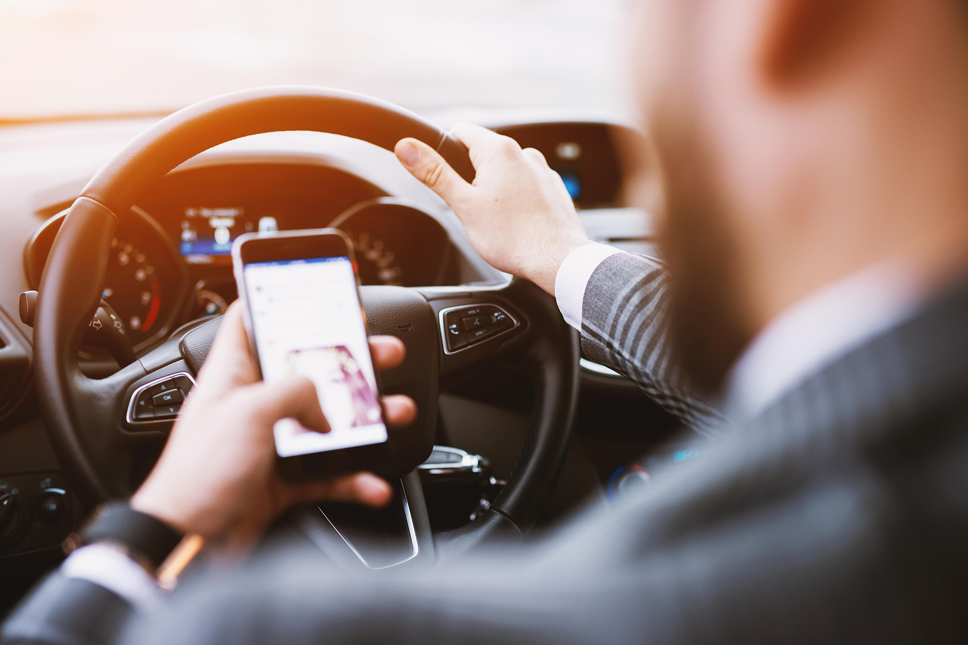 Driver Looking at Phone While Driving